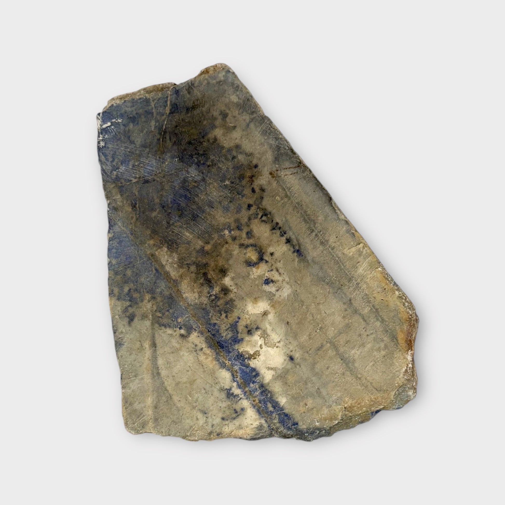 Raw back of Blue Lapis Lazuli slab showing natural stone texture