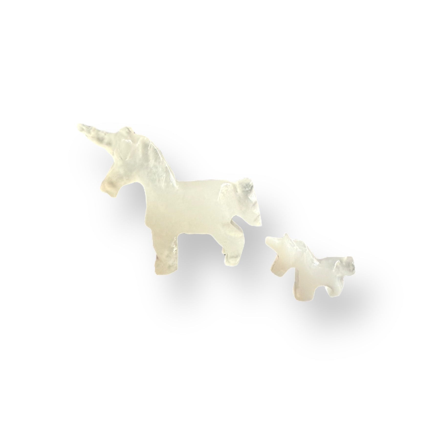 Calcite crystal unicorn figurine set with mother and baby carvings.