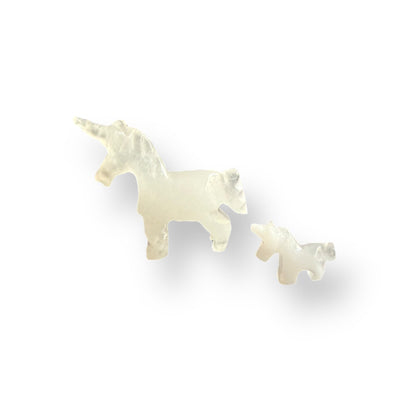 Calcite crystal unicorn figurine set with mother and baby carvings.