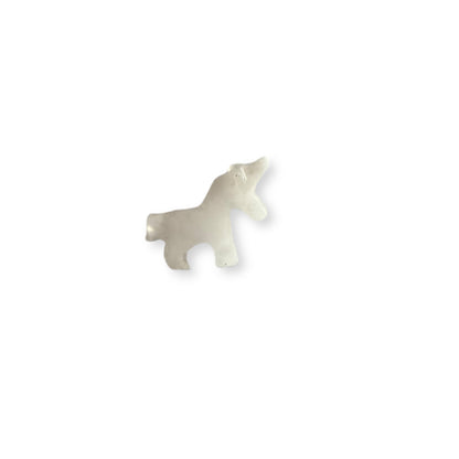 Mom and baby calcite unicorn crystal figurines on white background.