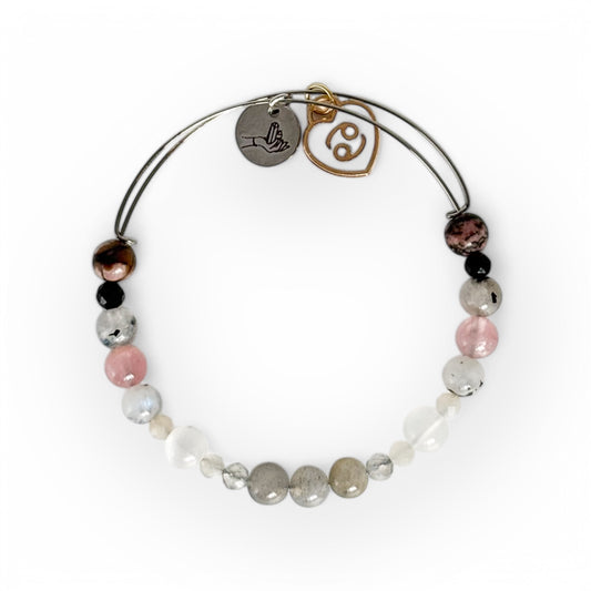 Cancer Crystal Charm Bracelet with a white charm, handcrafted with Labradorite, Moonstone, Selenite, Rose Quartz, Black Tourmaline, and Rhodonite for intuition and emotional balance.