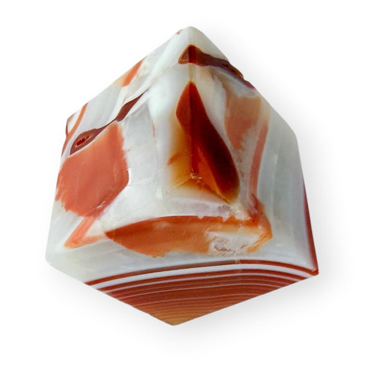 Polished Carnelian Agate self-standing cube with bold orange, red, and white banding.