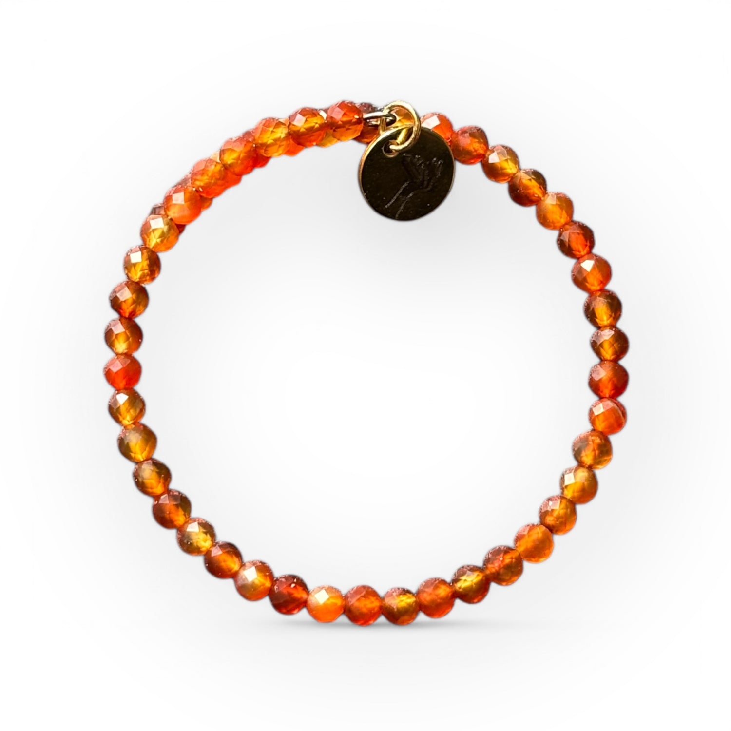 Carnelian wrap bracelet in natural sunlight, highlighting the stone’s warm, fiery tones.