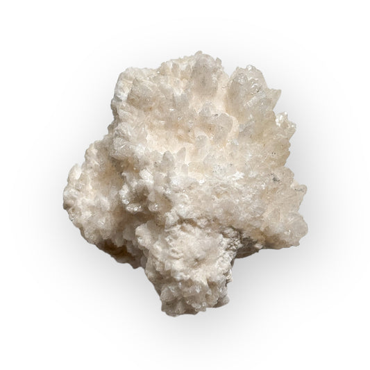 Overhead view of a Cave Calcite (Aragonite) cluster with white crystal growth and calming matte texture.