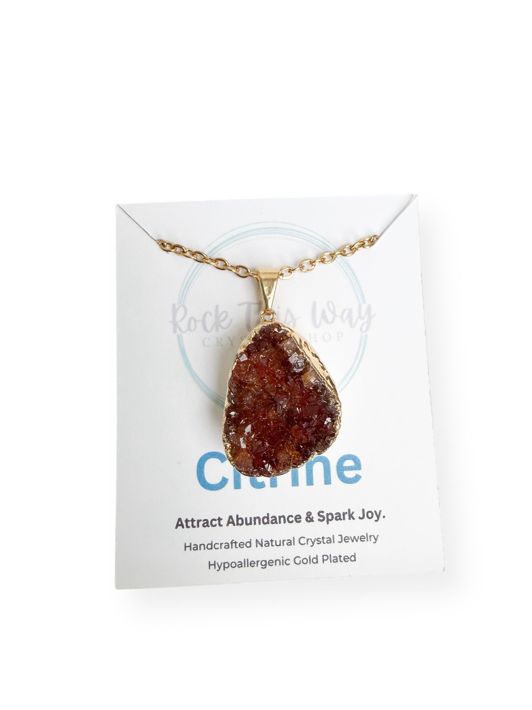 Gold plated citrine drusy cluster pendant necklace displayed on Rock This Way Crystal Shop packaging, ready for gifting.