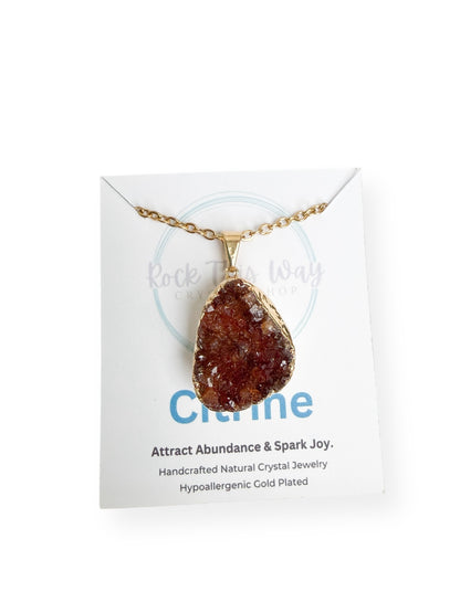 Gold plated citrine drusy cluster pendant necklace displayed on Rock This Way Crystal Shop packaging, ready for gifting.