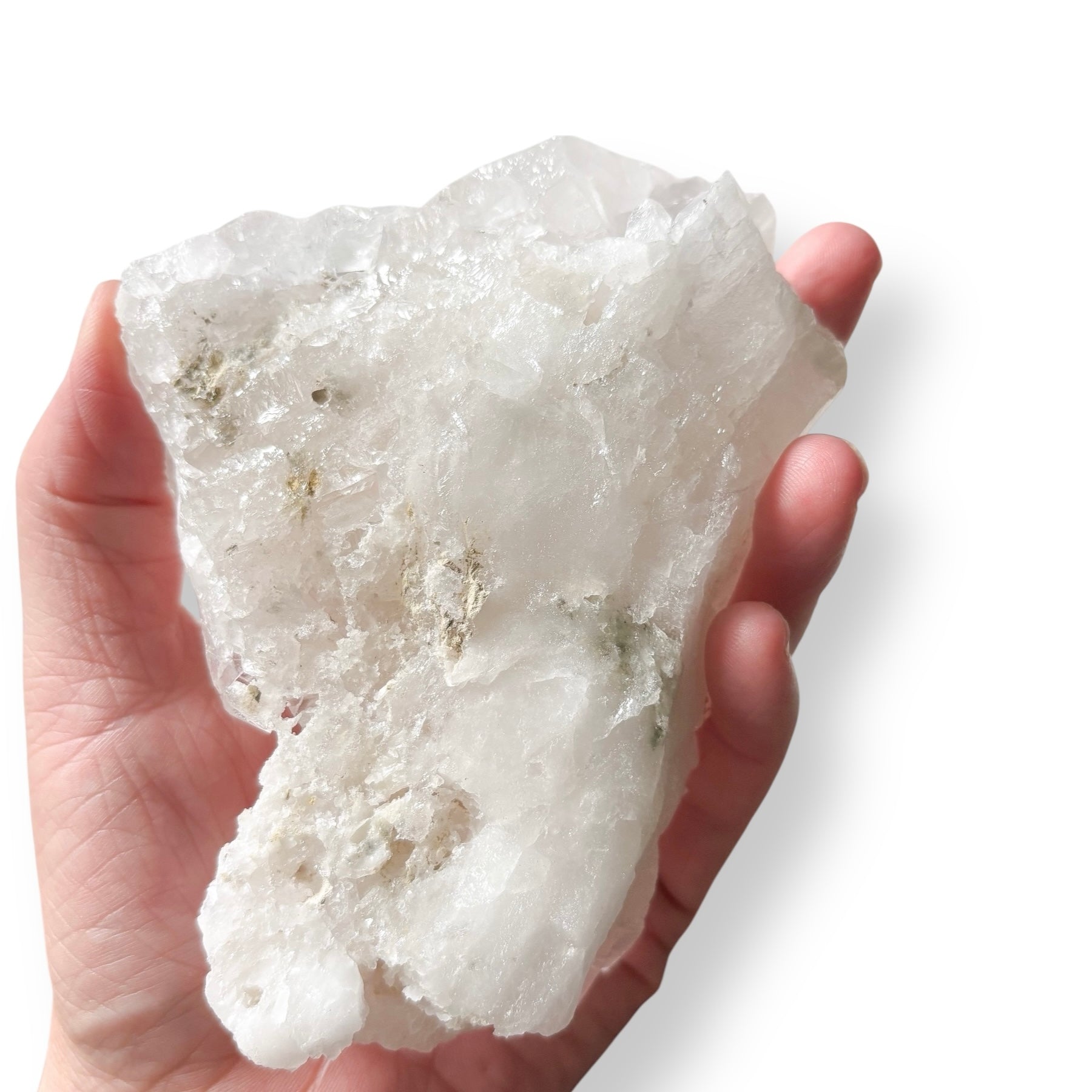 Clear Quartz cluster viewed from the side, showcasing layered points and natural rainbow flash.