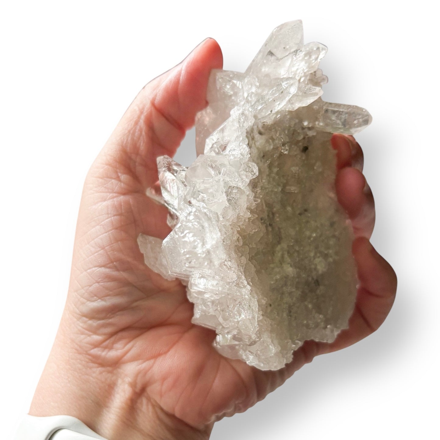 Raw Clear Quartz Cluster known for clarity, intention-setting, and energy amplification.