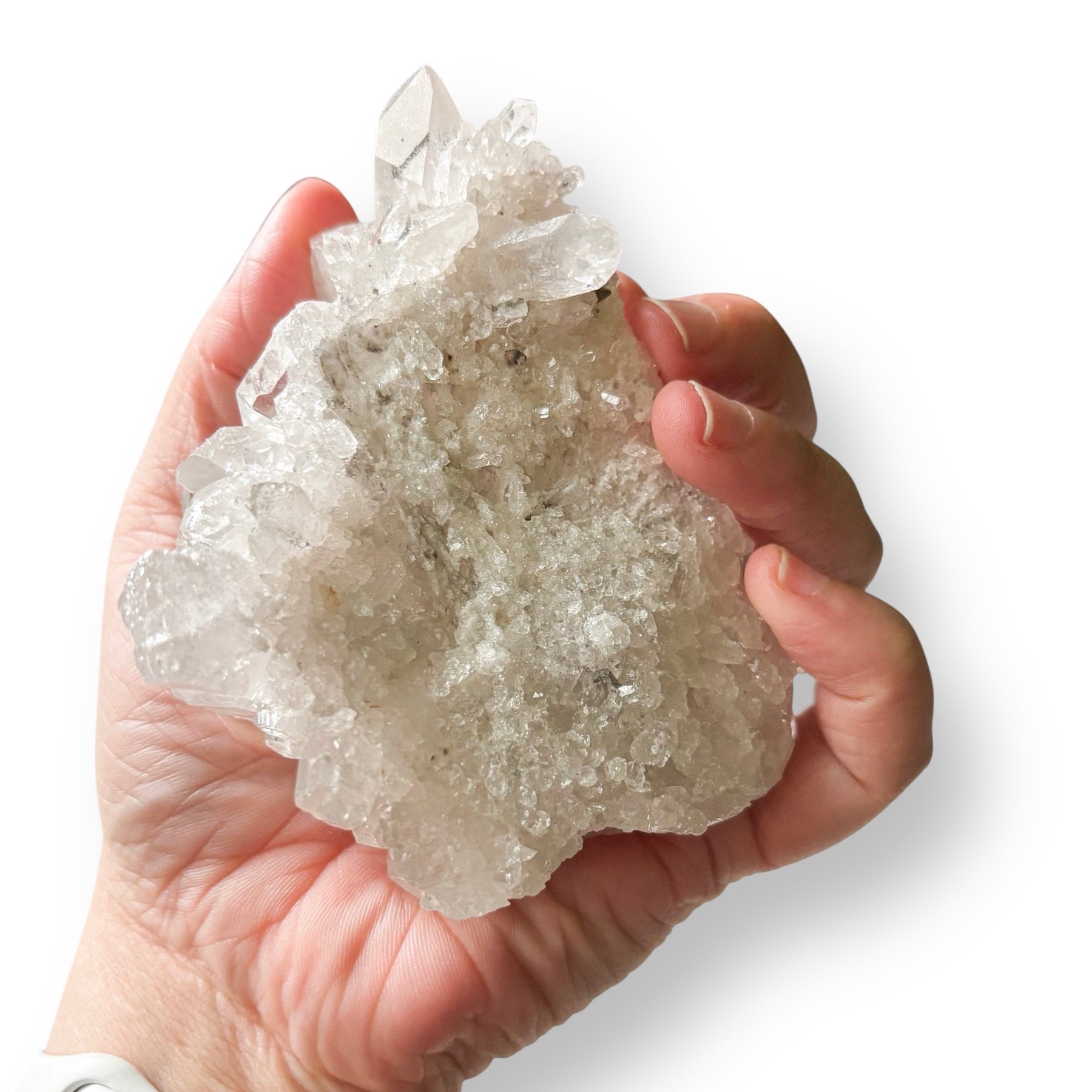 Clear Quartz Cluster held in hand for scale and detail.