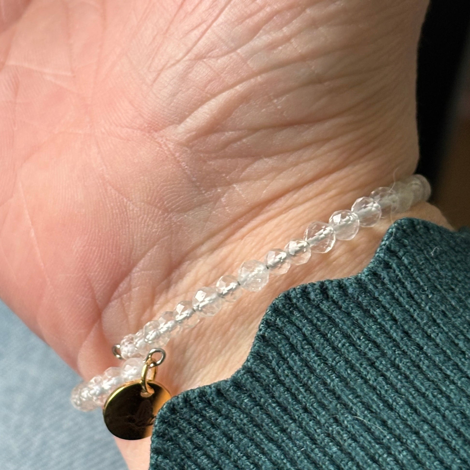 Clear Quartz wrap bracelet sparkling in natural light, symbolizing mental clarity and energy amplification.