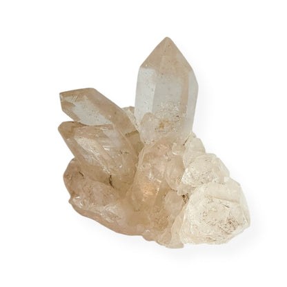 Side view of natural Clear Quartz cluster highlighting crystal points