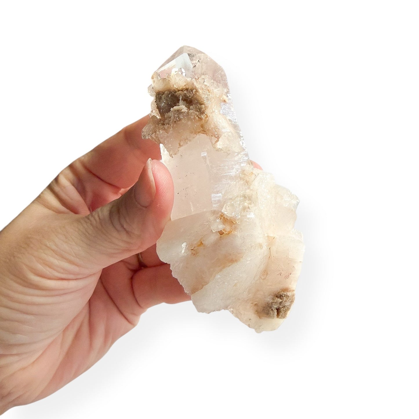 Hand holding Clear Quartz Point showing multiple smaller crystal points