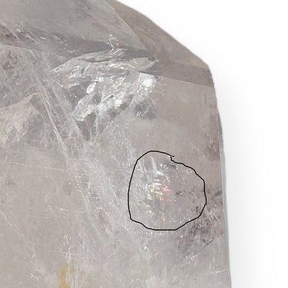Close-up of rainbow inclusion inside Clear Quartz crystal