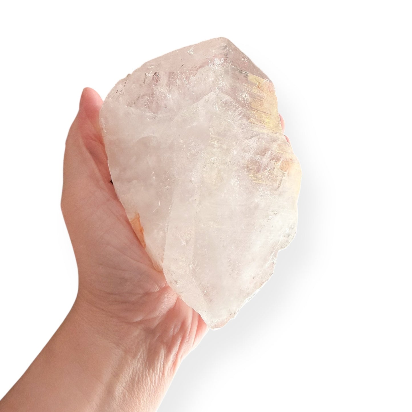 Hand holding Extra Large Clear Quartz Point to show size and clarity