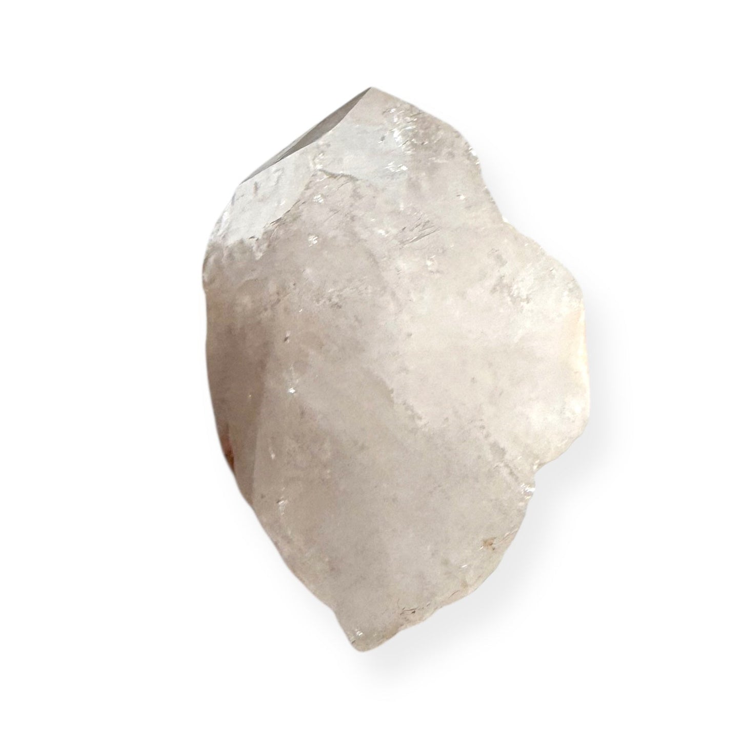 Side view of White Quartz Point showing natural milky color and shape