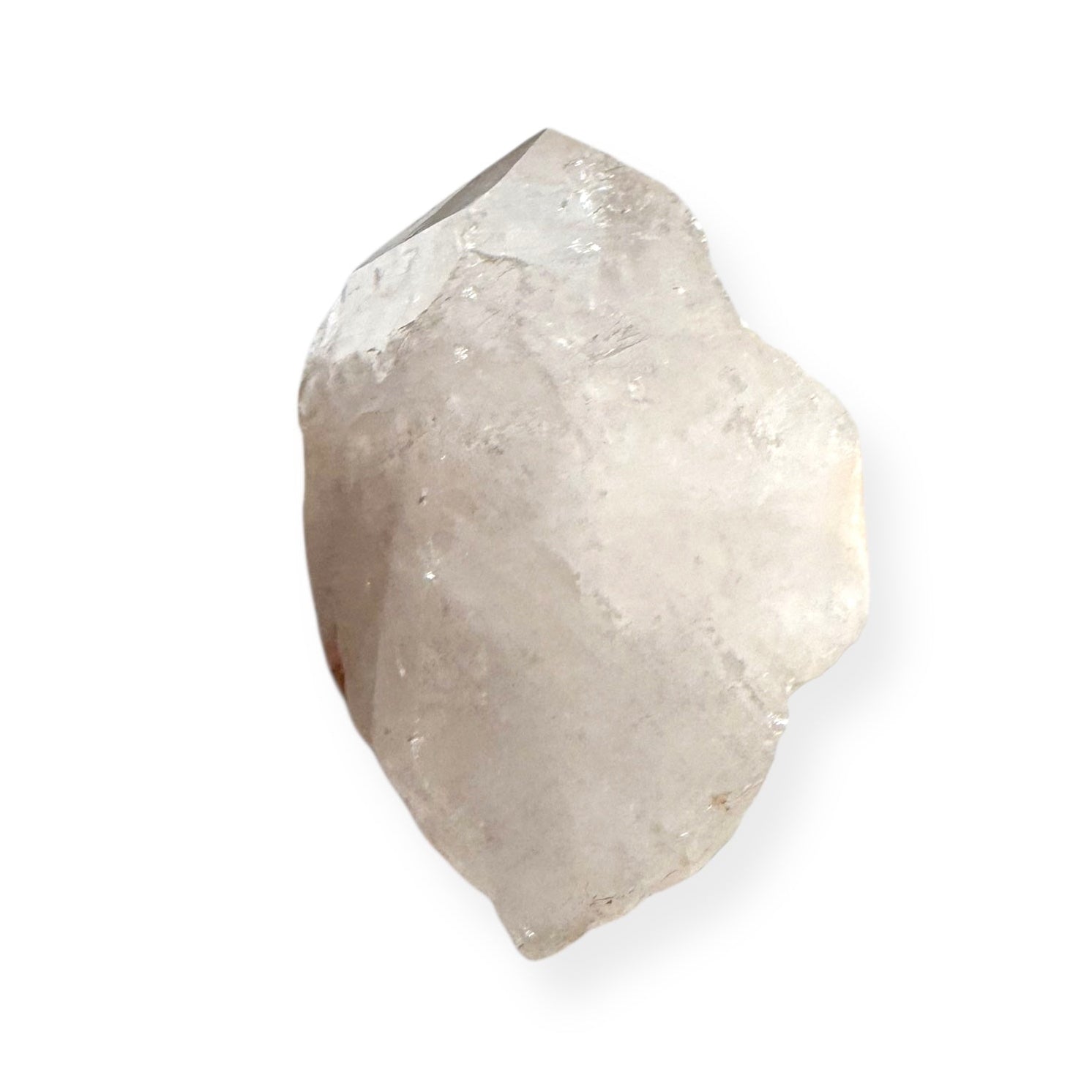 Side view of White Quartz Point showing natural milky color and shape