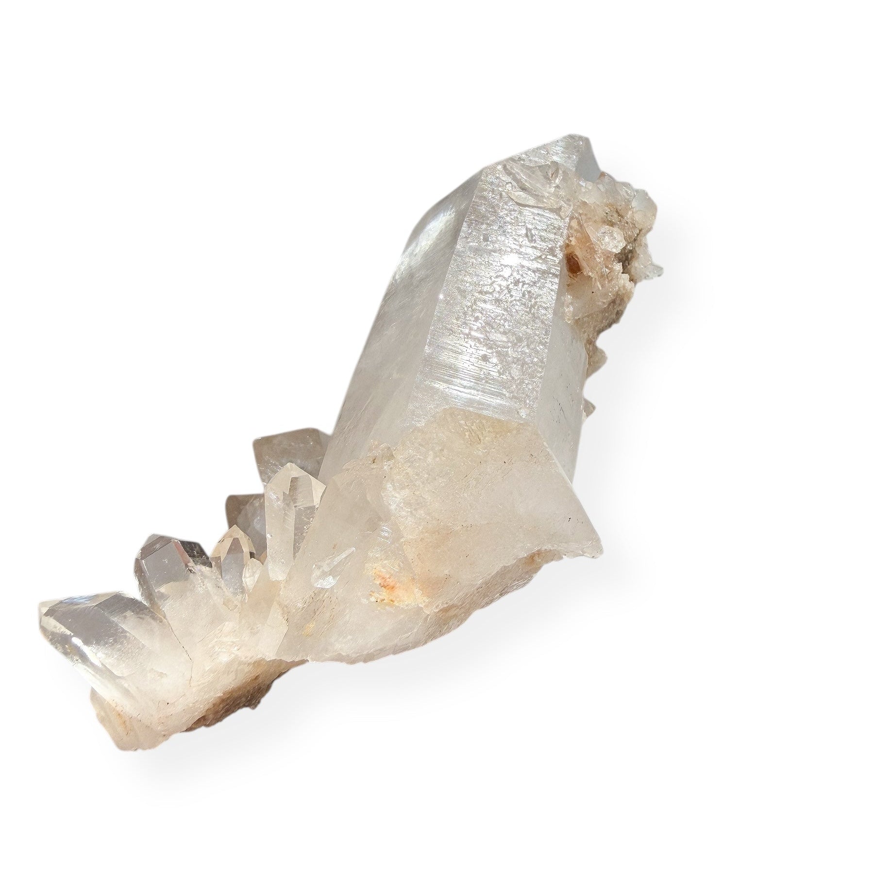 Clear Quartz Point with smaller crystal terminations on white background