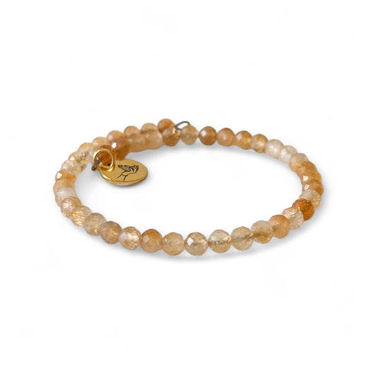 Close-up of Citrine crystal beads showing golden sparkle