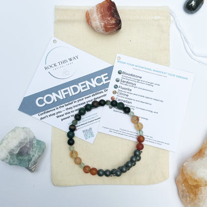 Men’s Confidence Bracelet displayed with gift-ready muslin bag and meaning card