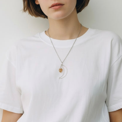 AI model wearing crescent moon citrine silver plated pendant necklace on stainless steel chain