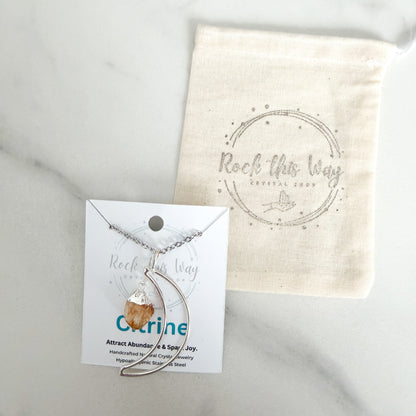 Crescent moon citrine silver plated pendant necklace packaged with polishing cloth