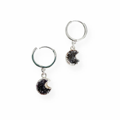 Crescent moon drusy huggie earrings in white gold filled metal on a white background