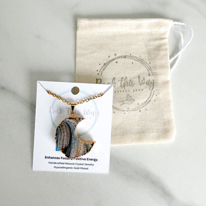 Gold plated crescent moon drusy pendant necklace displayed on Rock This Way Crystal Shop packaging, ready for gifting.