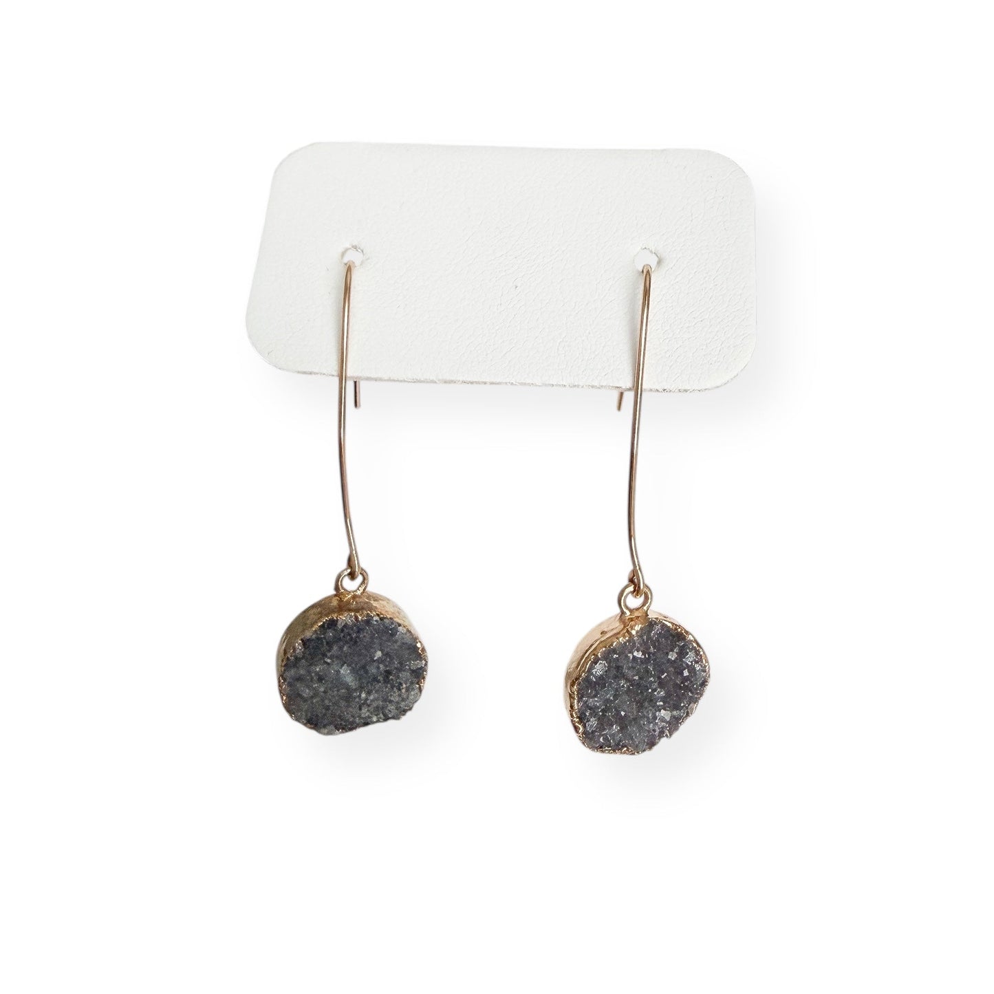 Side view of dark gray round drusy earrings highlighting gold filled ear wires and lightweight drop design