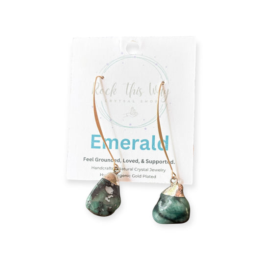 Close-up of raw Emerald Drop Earrings on Rock This Way jewelry card.