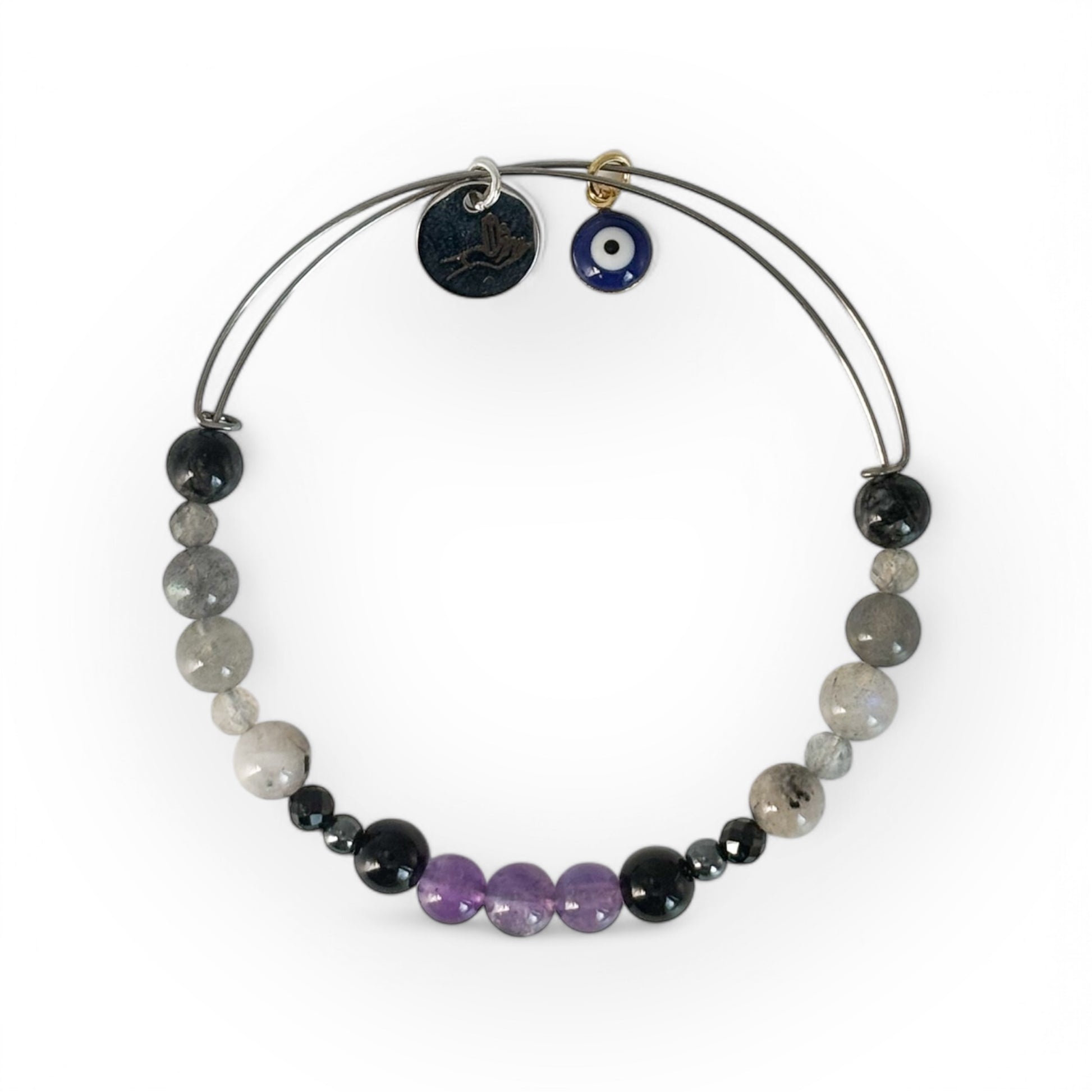 Protection Crystal Bracelet with amethyst and black tourmaline on meaning card