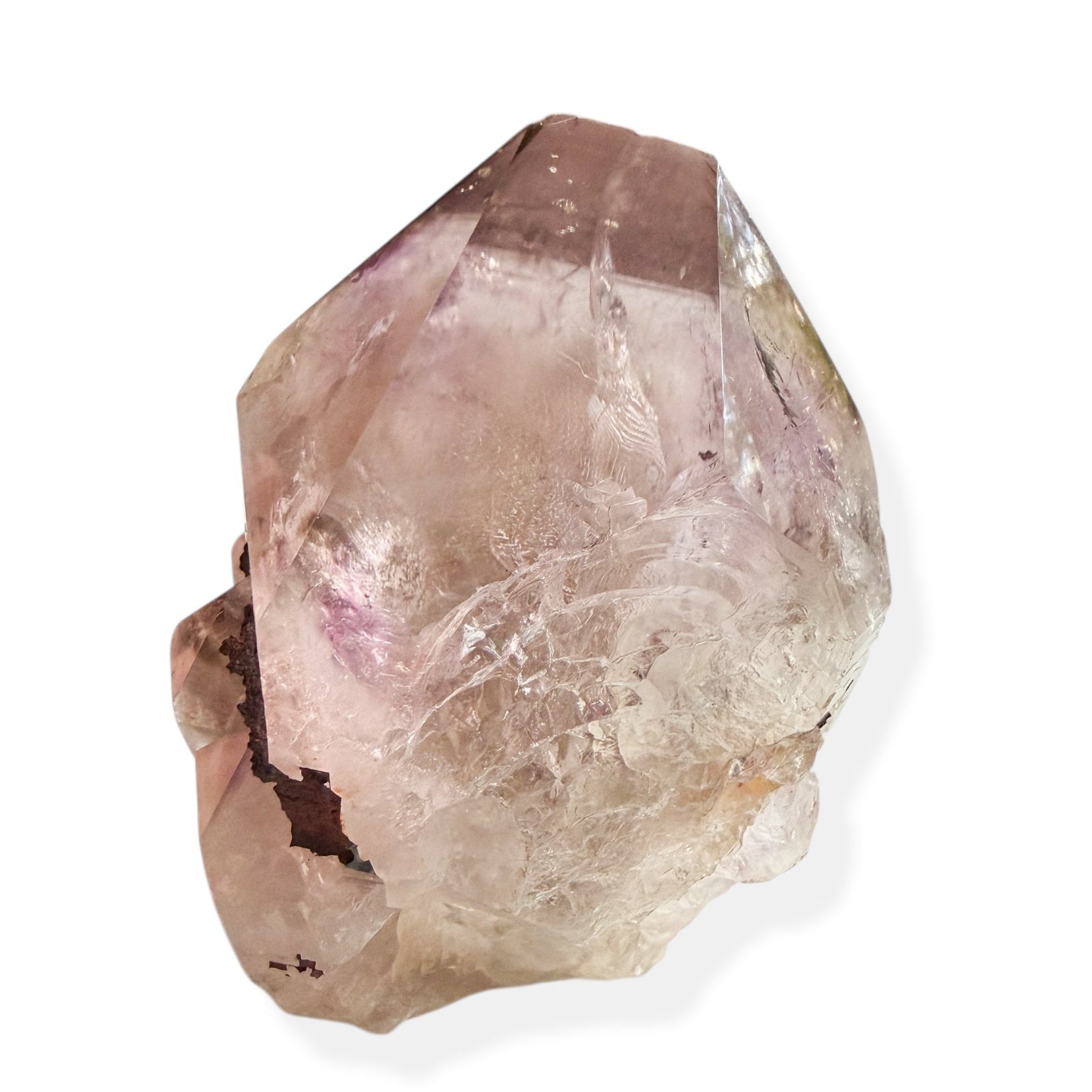Amethyst crystal point with visible inclusions and clarity