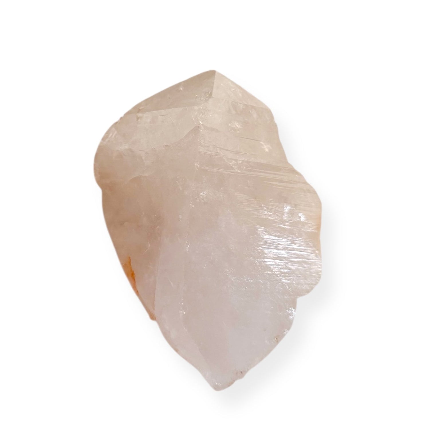 Extra Large White Quartz Point crystal with soft white glow on white background
