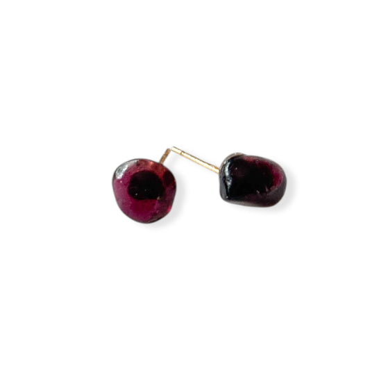 Garnet stud earrings displayed on white background with hypoallergenic posts