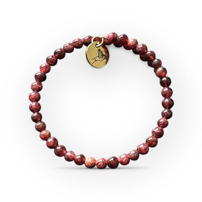 Garnet wrap bracelet with 4mm polished round beads, handcrafted for strength and passion.