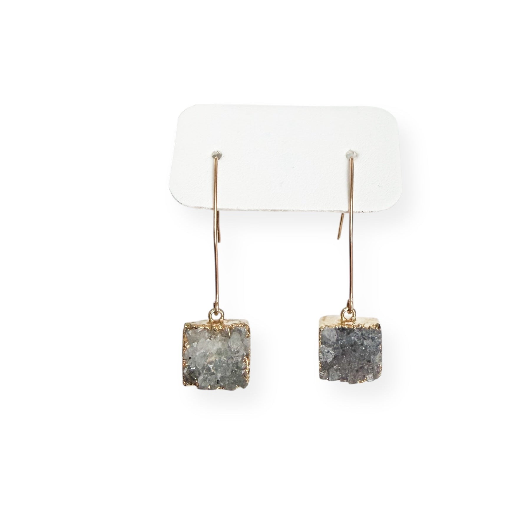 Close-up of gray square drusy crystal earrings showing natural sparkle and gold filled setting