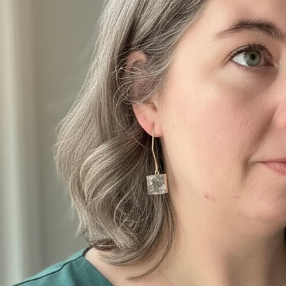 Model wearing gray square drusy earrings with gold filled ear wires and soft gray crystal sparkle