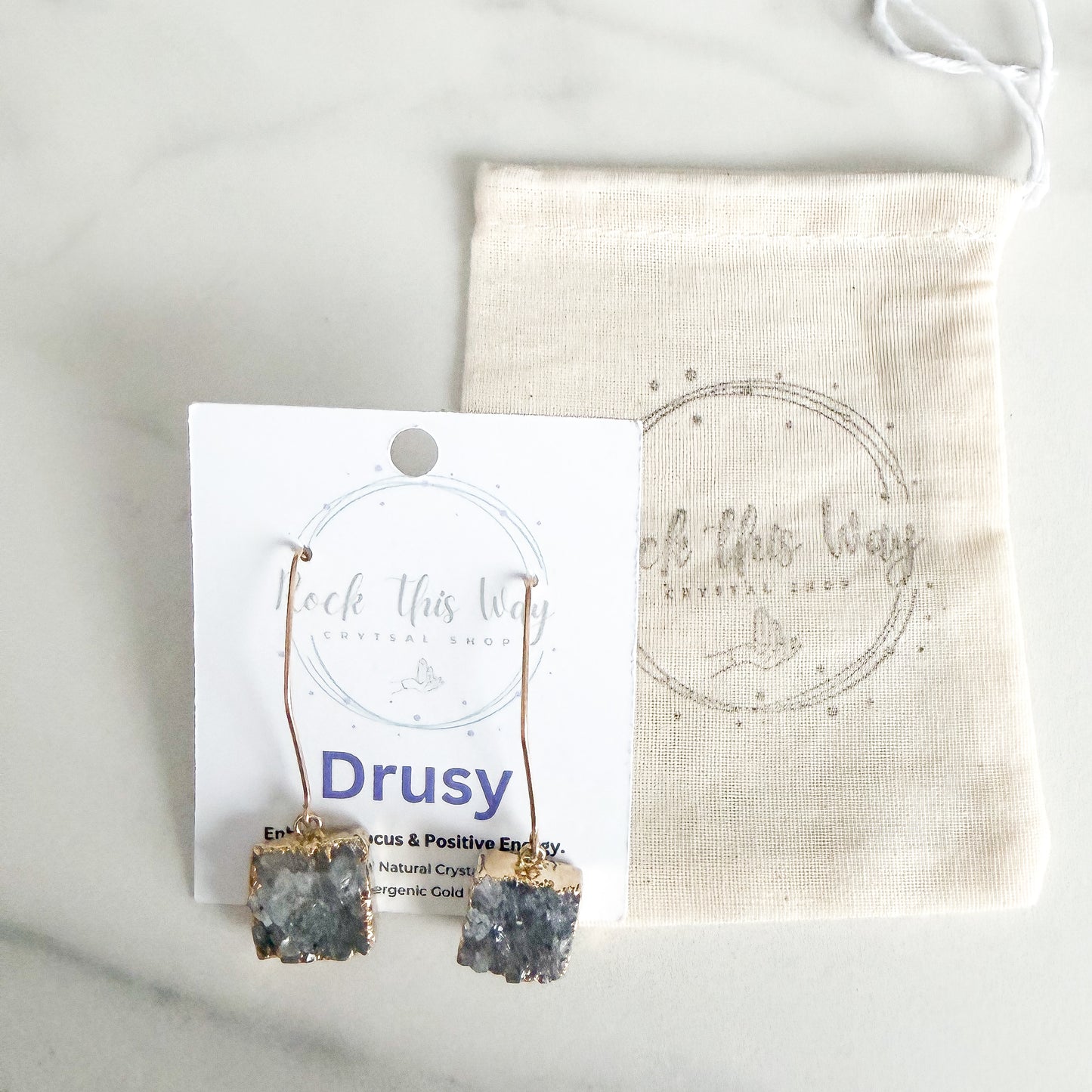 Gray square drusy earrings packaged on jewelry card ready for gifting