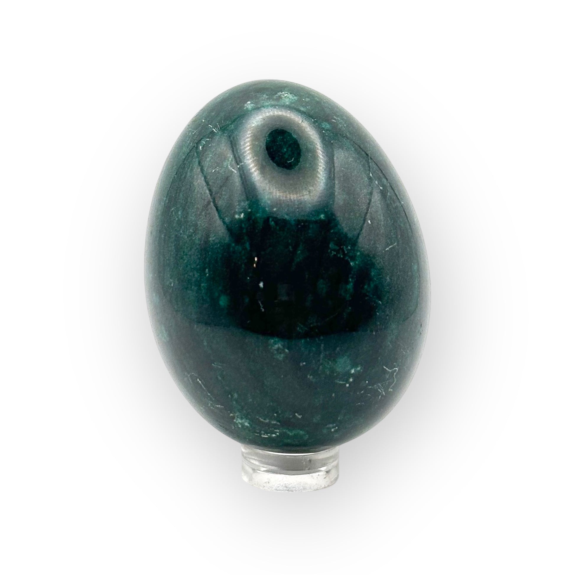 Close-up of Green Aventurine egg highlighting its soft shimmer and energetic stone pattern