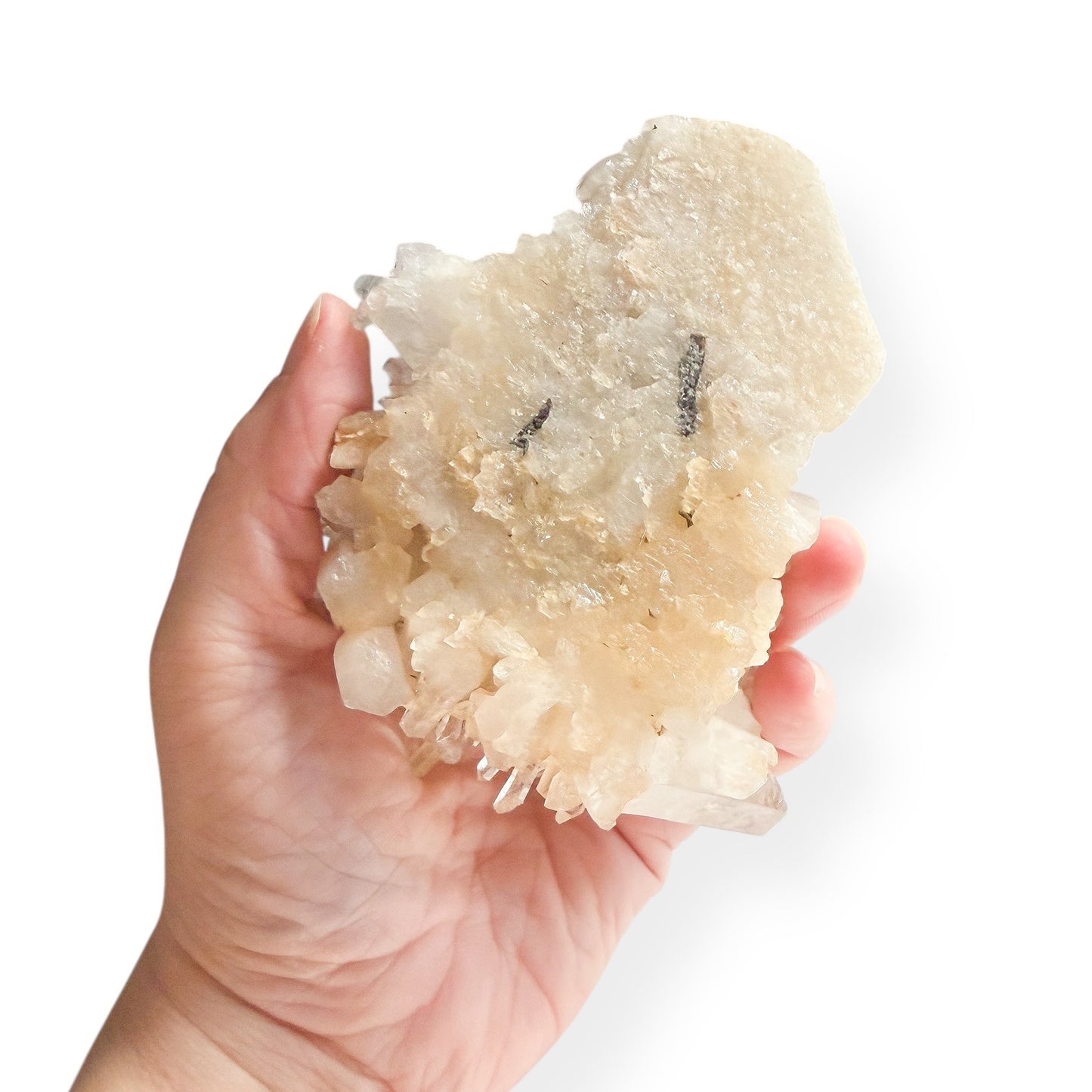 Hand holding large Clear Quartz Cluster to show size and structure