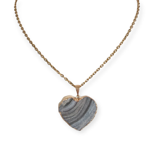 Gold plated heart drusy pendant necklace with natural gray crystal tones on a PVD gold plated stainless steel chain.