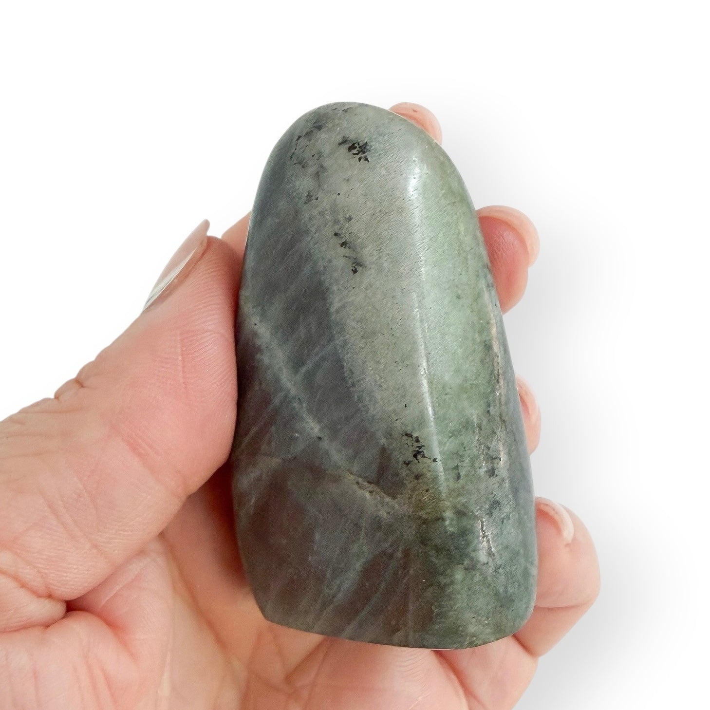 Side view of a polished Labradorite free form with natural gray-green coloring and internal patterning.