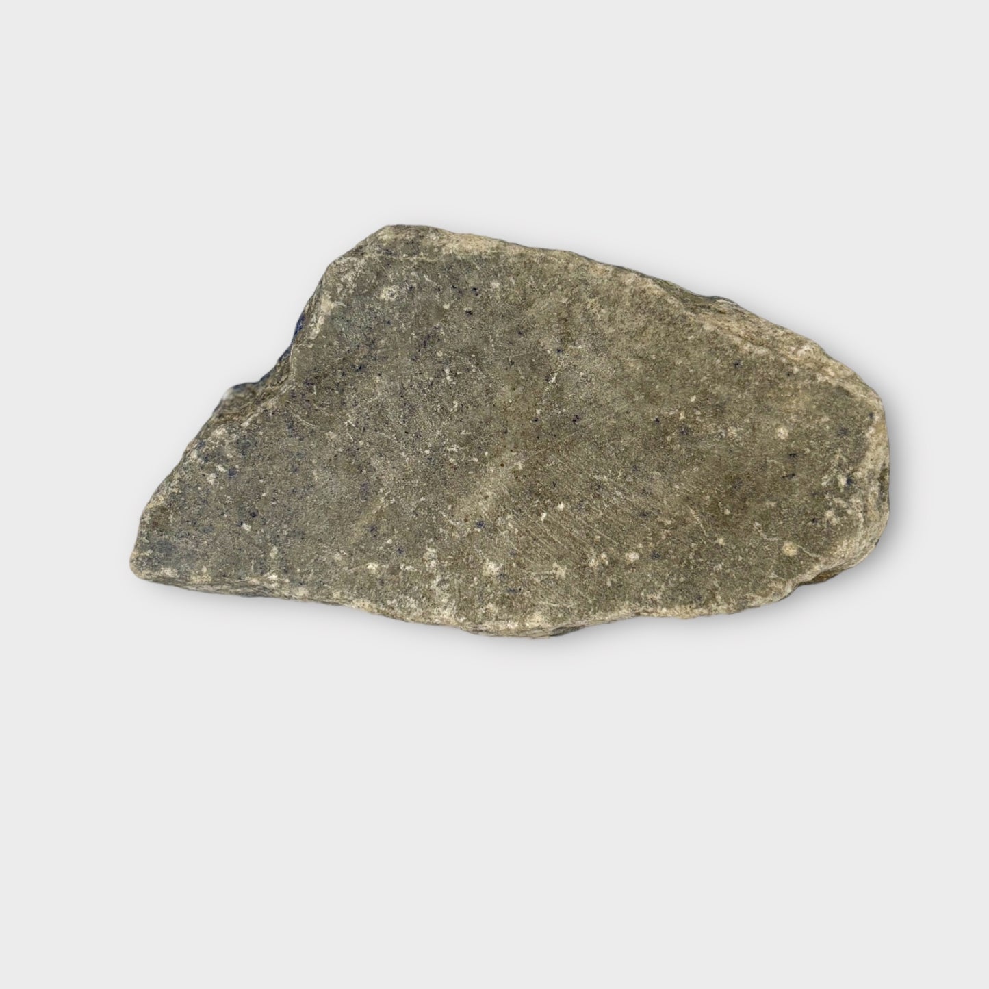 Raw side of Lapis Lazuli crystal slab with earthy, natural finish