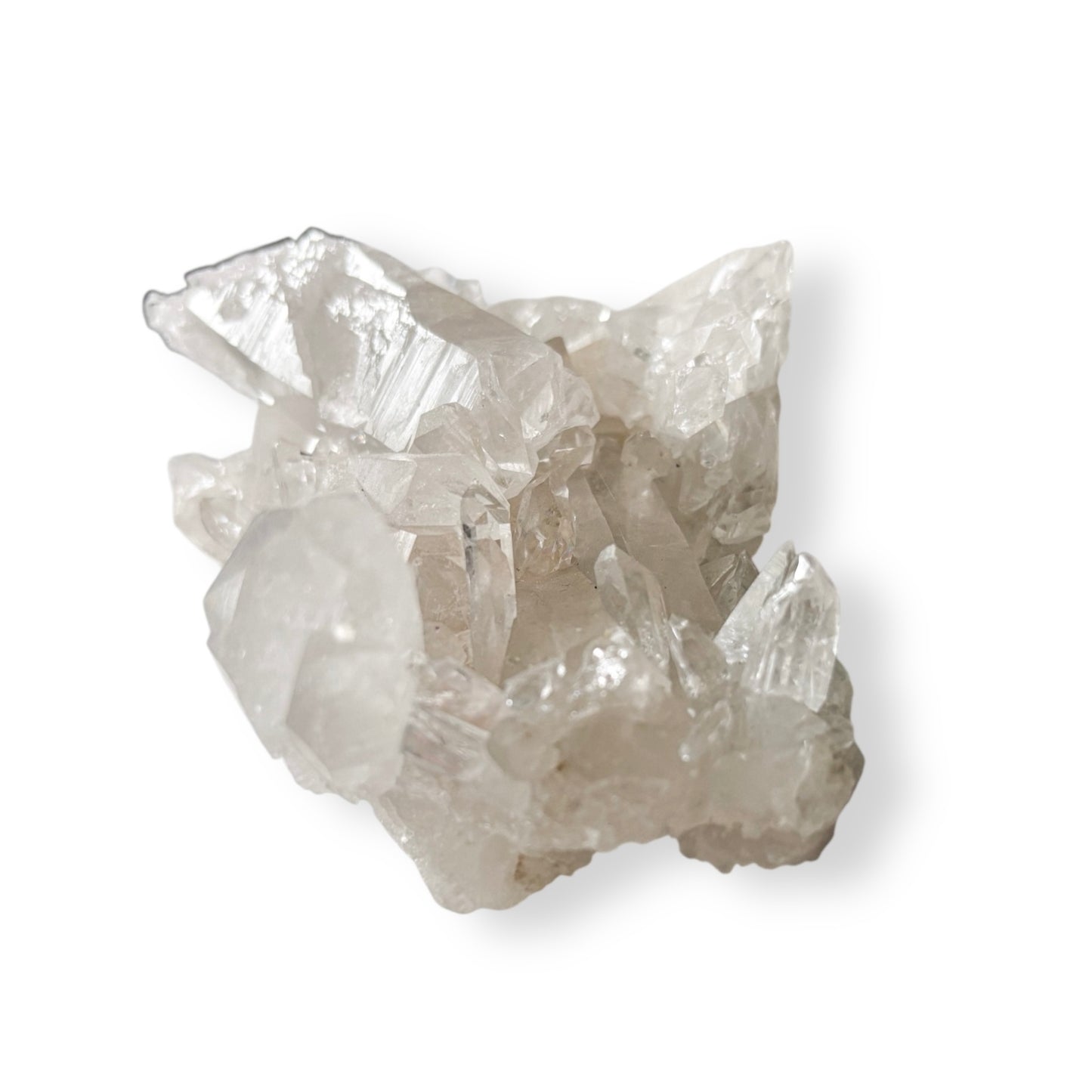 Large Clear Quartz crystal cluster with stacked points and brilliant clarity shown in hand.