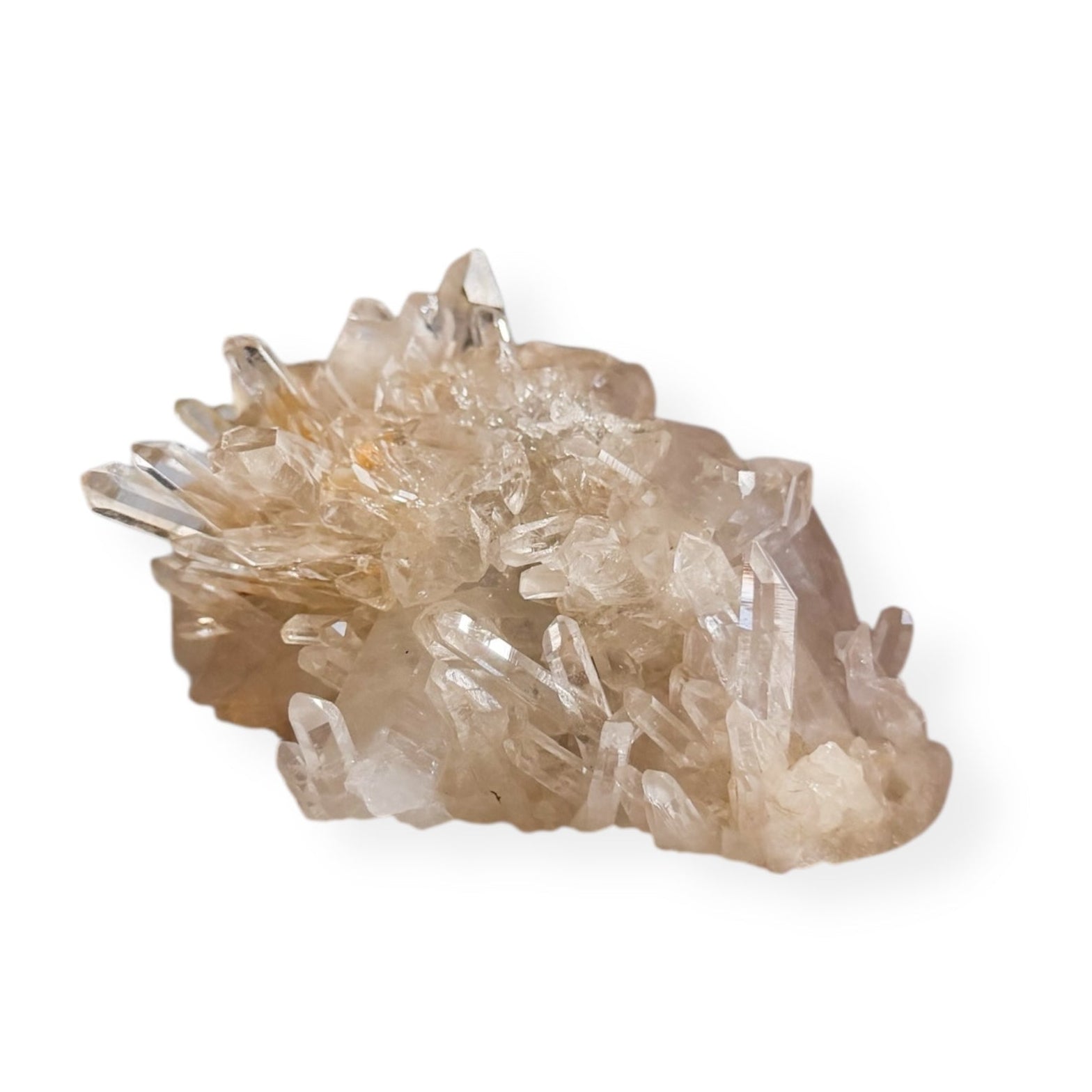 Large Clear Quartz Cluster with multiple crystal points on white background