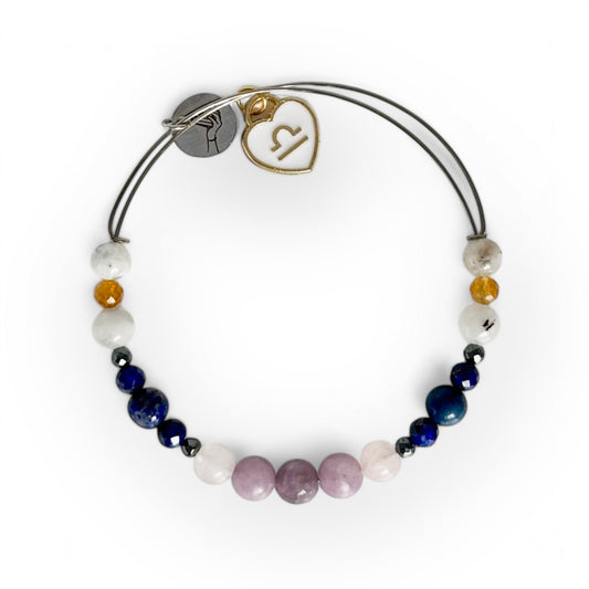 Libra Crystal Charm Bracelet with a white charm, handcrafted with Lepidolite, Rose Quartz, Hematite, Lapis Lazuli, Moonstone, and Citrine for balance and harmony.