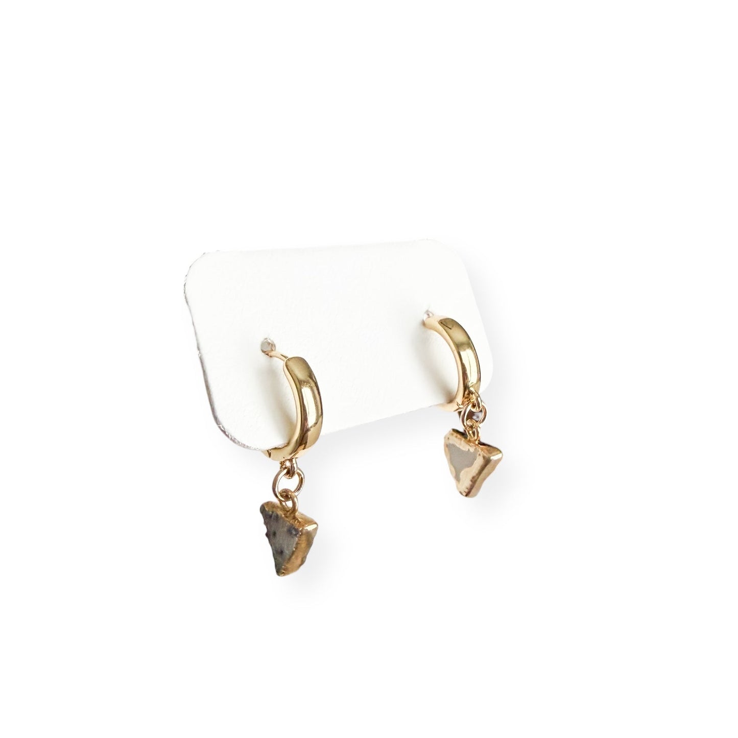Close up of light triangle drusy crystal charms with natural sparkle on gold filled huggie earrings