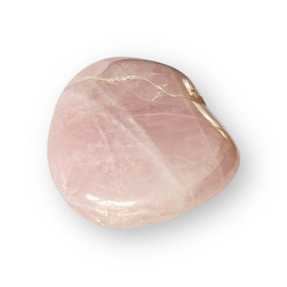 Natural polished Rose Quartz stone showing light blush tones.
