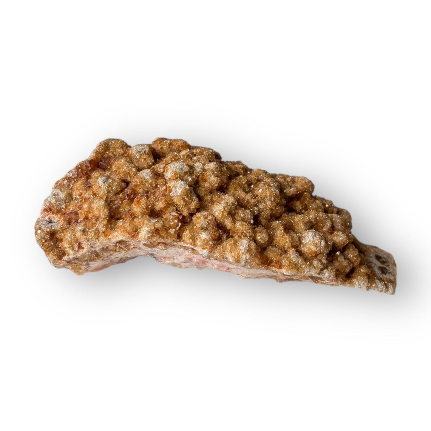 Close-up of Red-Orange Aragonite crystal with druzy sparkle and smooth surface detail.