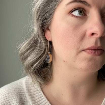 Oval drusy earrings in smoky gray tones with gold filled ear wires worn on model, lightweight 2 inch drop earrings