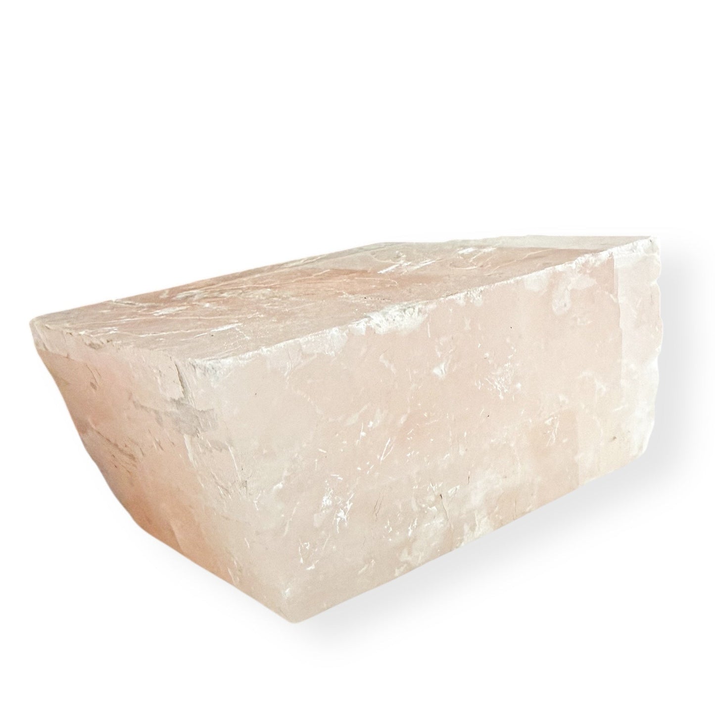 Close-up detail of pink Icelandic Calcite showing natural light refraction and internal structure.